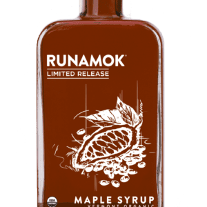 A bottle of maple syrup with an orange design.