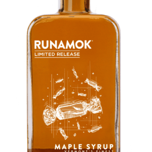 A bottle of maple syrup with an image of a candy wrapper.