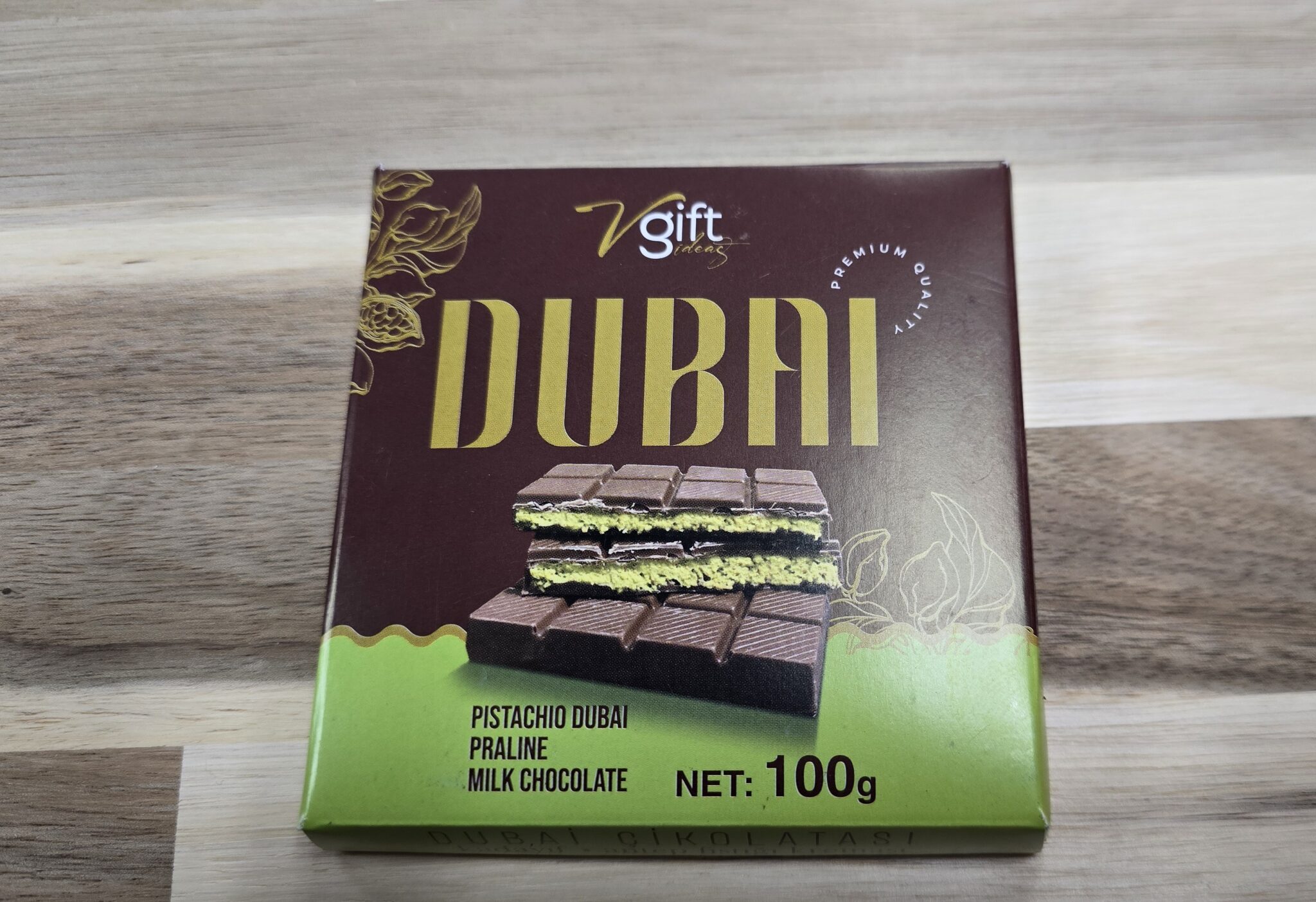 Chocolate box labeled Dubai with pistachio praline.